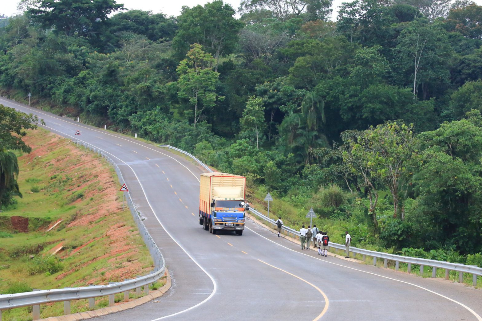 Truck rolling along a road in Uganda, Africa.